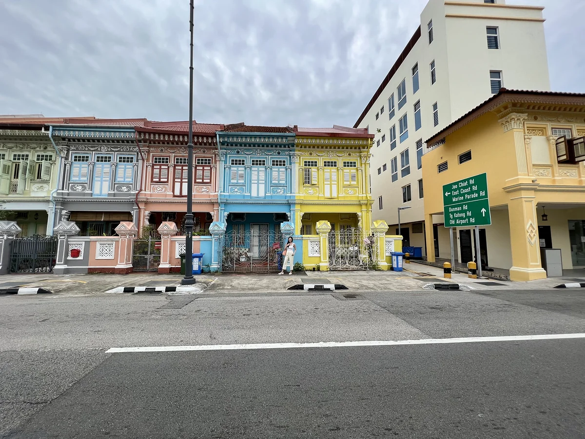 Wide view of the colourful Koon Seng Road terrace houses and the road in front